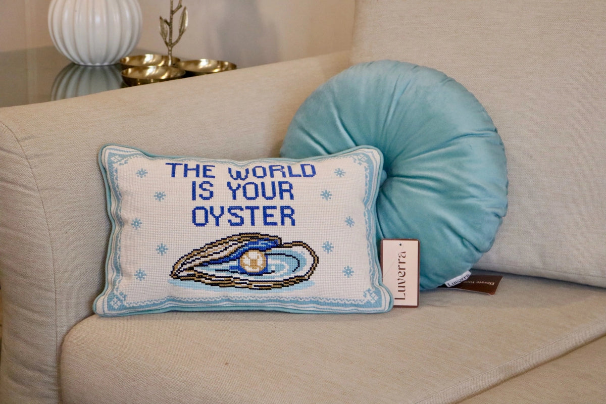 The World Is Your Oyster cross-stitch cushion, detail view
